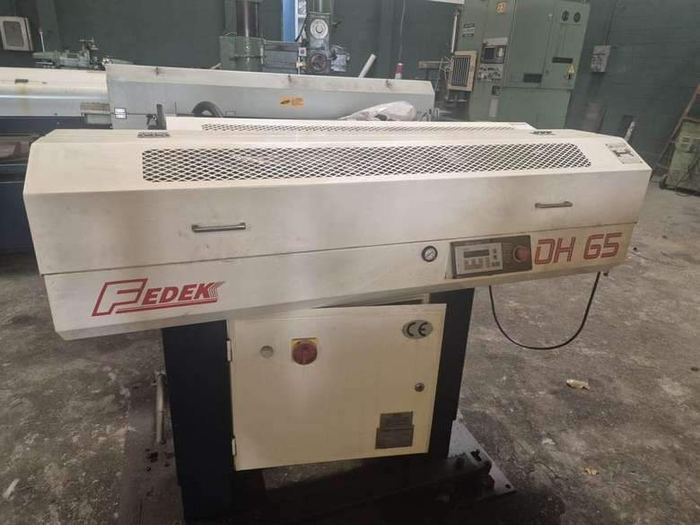 FEDEK DH 65 - Caricabarre automatico