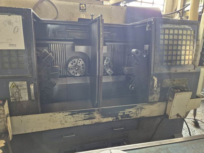 Tornio CNC bimandrino bitorretta Hwacheon ECO-2SP3 usato